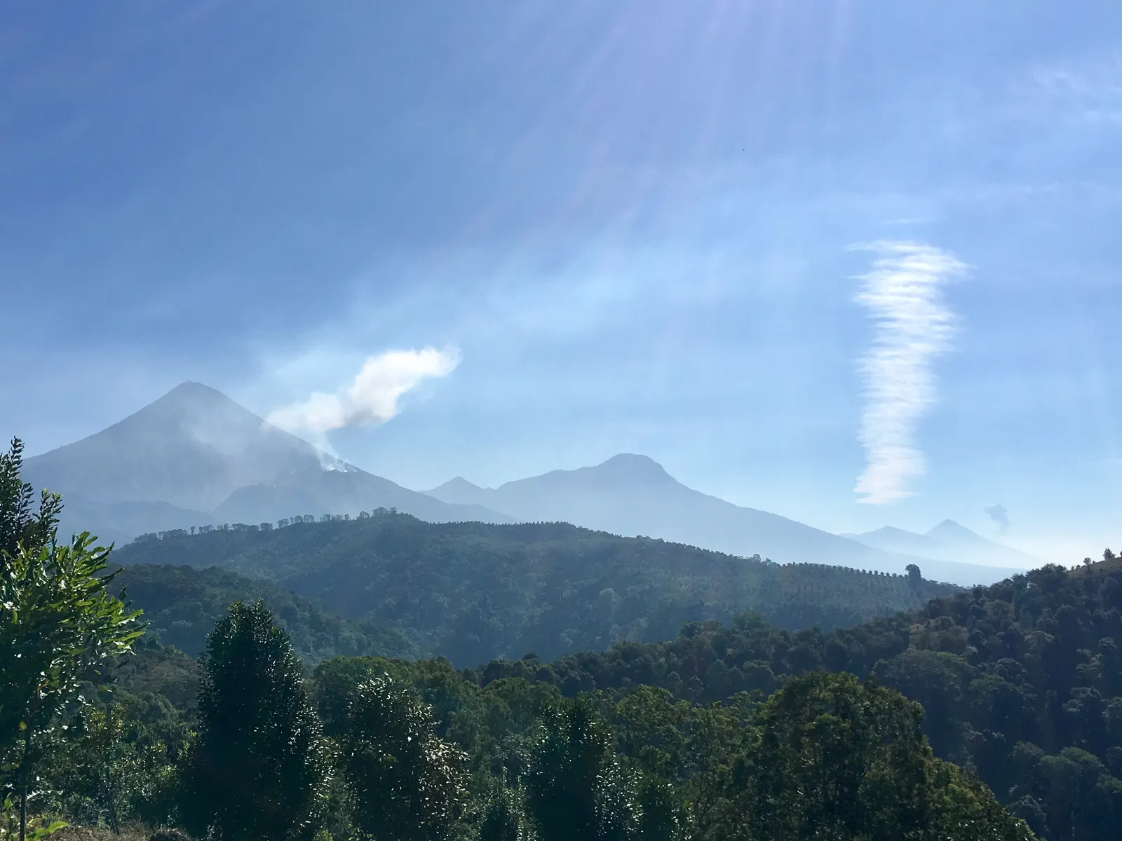 The Santiaguito volcano with a fumarole above the Culpan farm